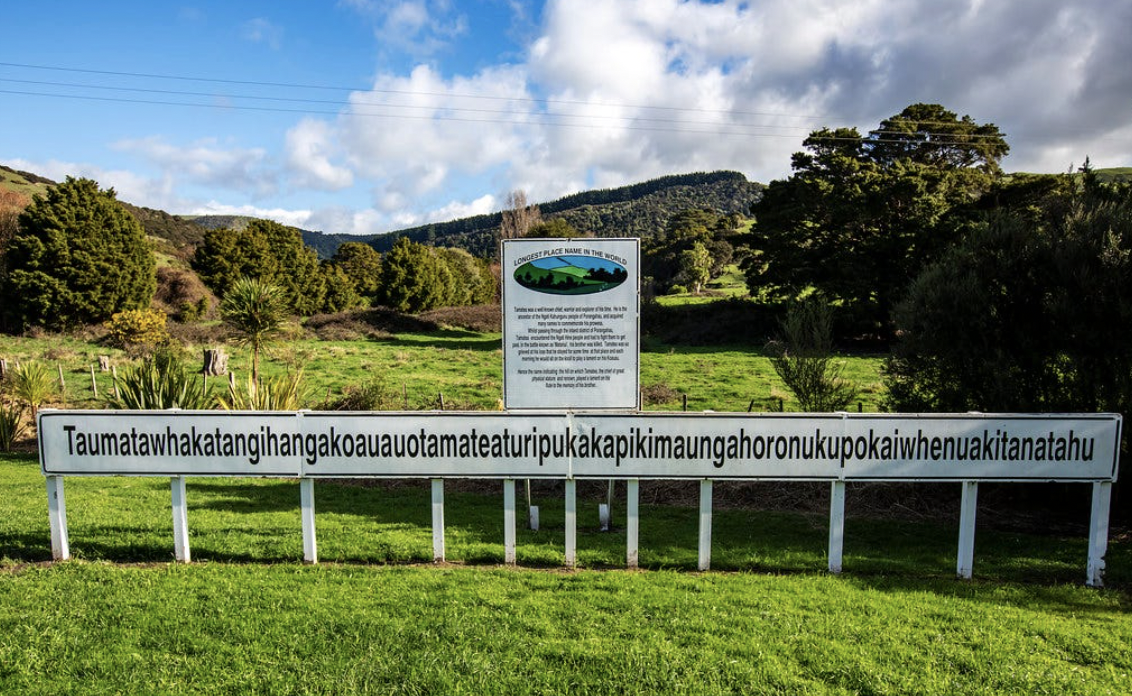 The longest place name on Earth is 85 letters long; “Taumatawhakatangihangakoauauotamateaturipukakapikimaungahoronukupokaiwhenuakitanatahu.” It is a hill in New Zealand that’s name means "The summit where Tamatea, the man with the big knees, the slider, climber of mountains, the land-swallower who traveled about, played his flute to his loved one" in the Maori language.