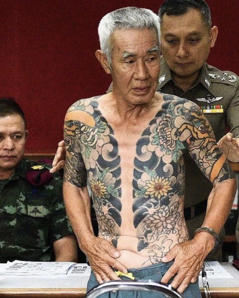 Yakuza boss being arrested in Thailand after photos of his tattoos went viral online in 2018.