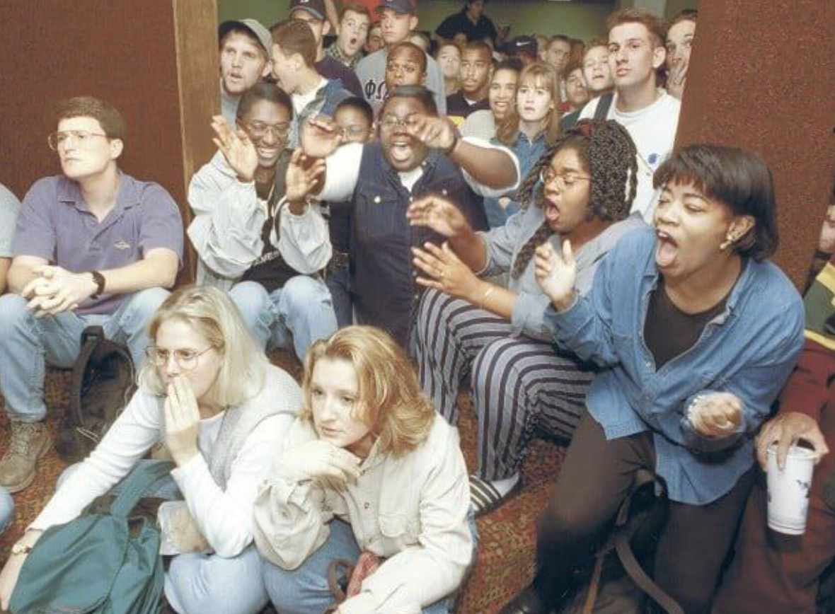 Students at Augustana College react to the verdict of O.J. Simpson’s murder trial, 10/3/1995.