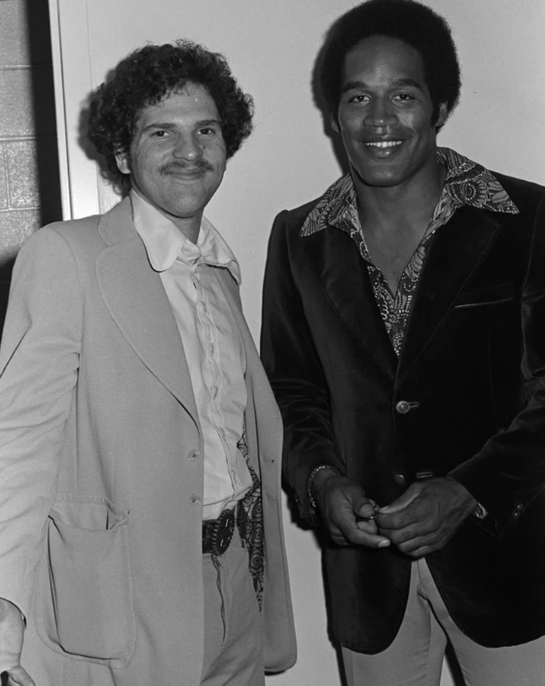 Harvey Weinstein and OJ Simpson backstage at a Bob Hope show, 1973.
