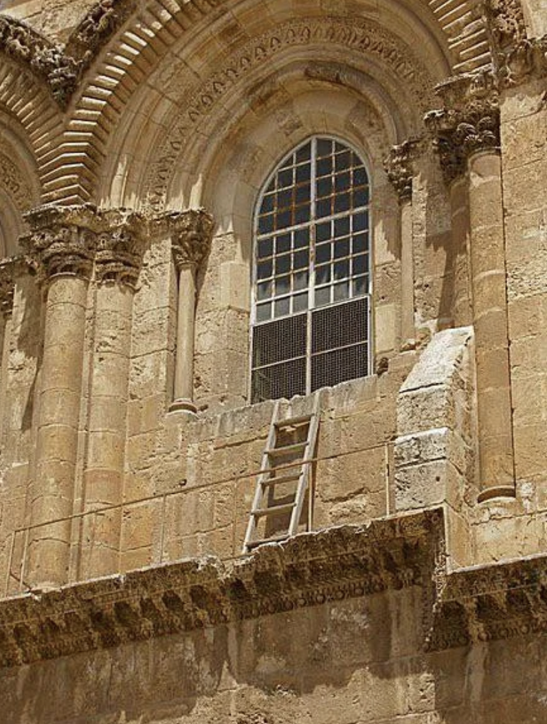 Ladder left by worker on Church of Holy Sepulchre in the 1700s, due to a status quo.