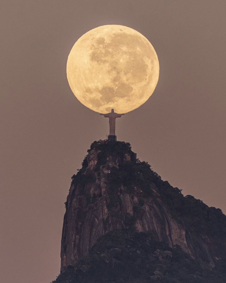 christ the redeemer holding the moon