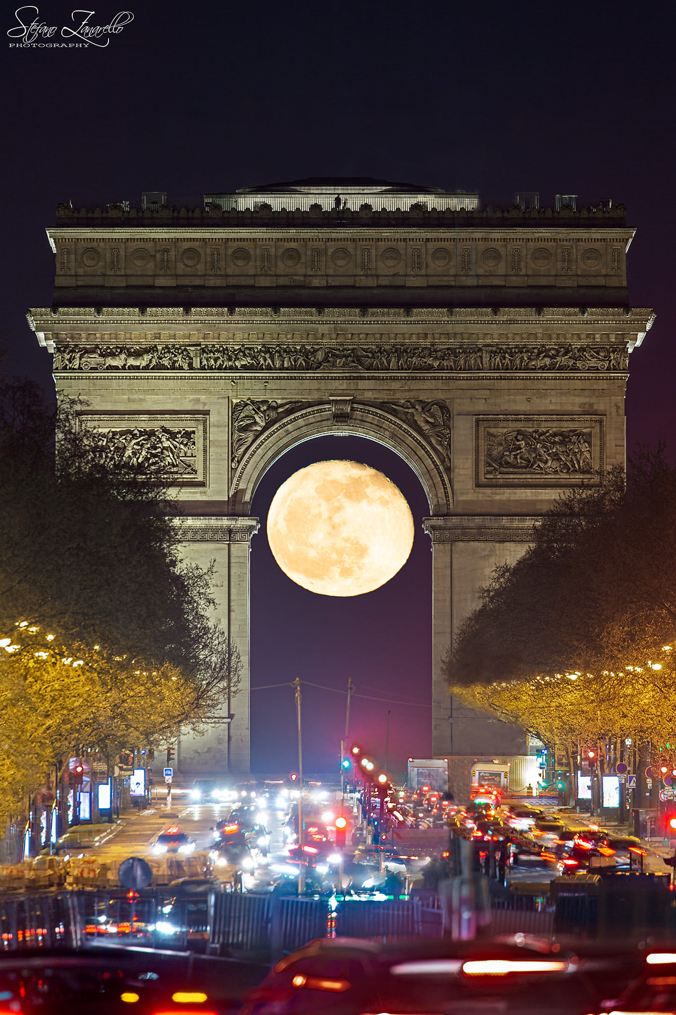 arc de triomphe with moon