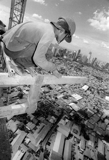 man works vintage construction