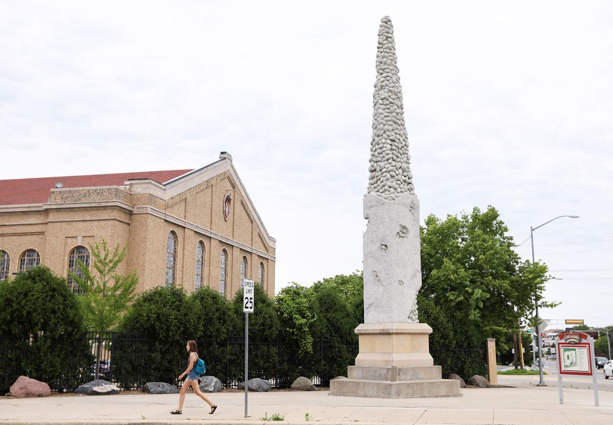 This once despised statue stood outside the University of Wisconsin's Camp Randall Stadium and was the brainchild of New York-based sculptor and former UW-Madison alumni, Donald Lipski. What do you see? Footballs or . . 