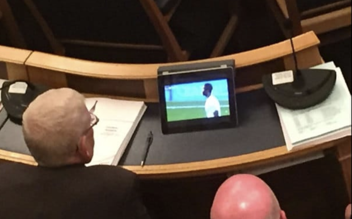 Croydon Labour councilors caught watching football during meeting to discuss cuts.