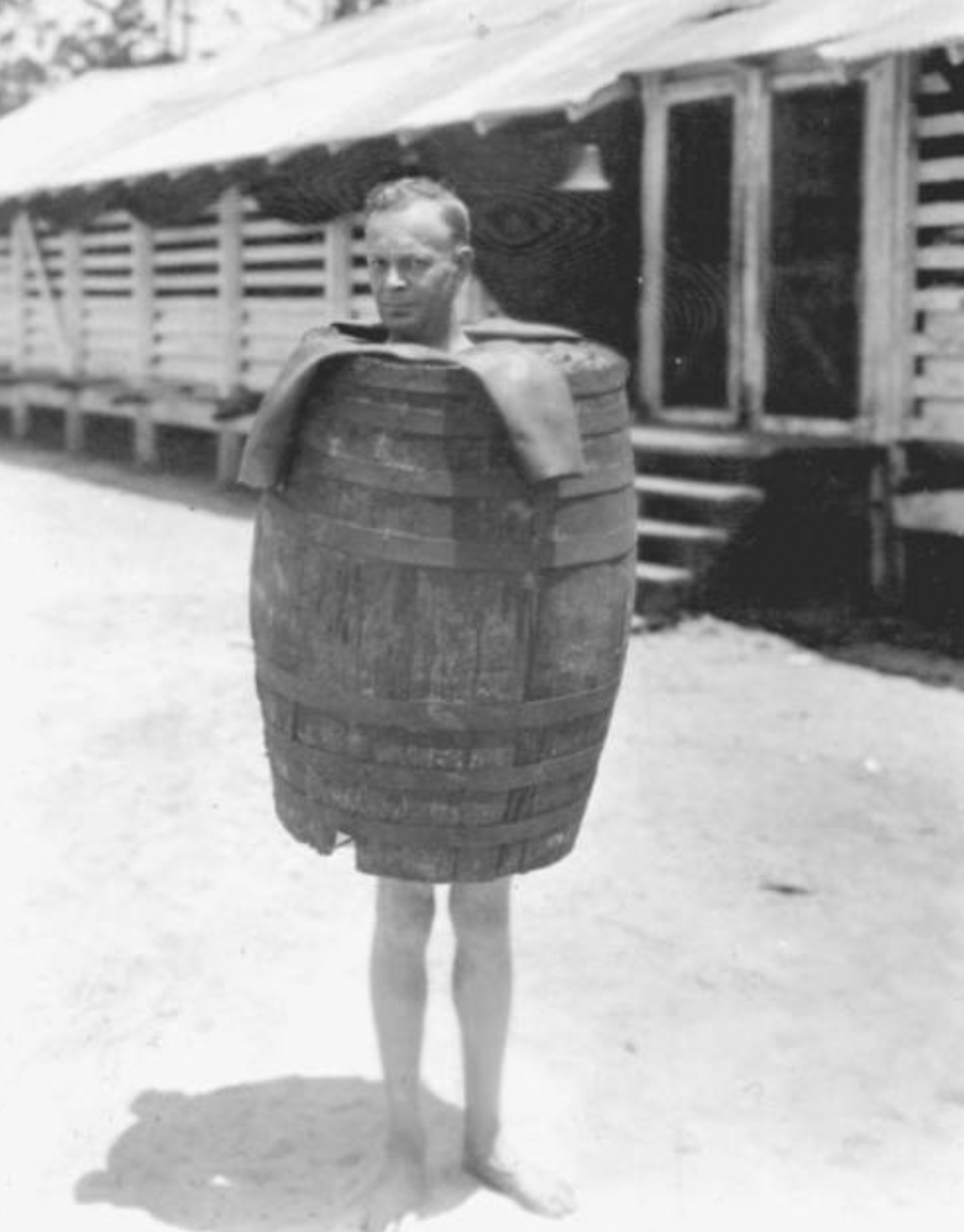 poor man wearing a barrel