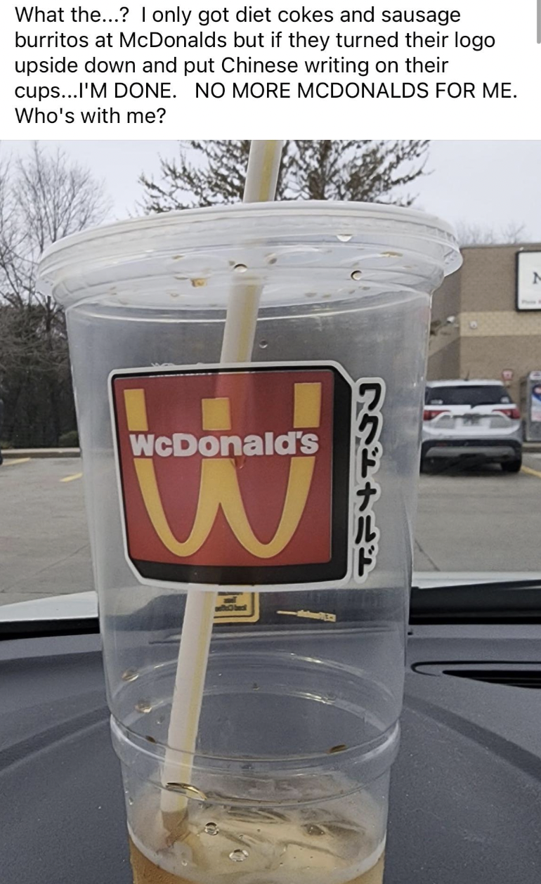 iced coffee - What the...? I only got diet cokes and sausage burritos at McDonalds but if they turned their logo upside down and put Chinese writing on their cups...I'M Done. No More Mcdonalds For Me. Who's with me? WcDonald's W