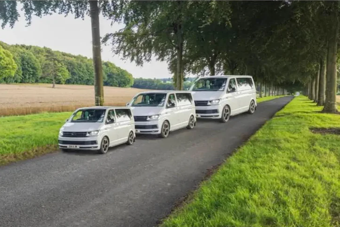 The Ponzo illusion. Each van is the same size. 