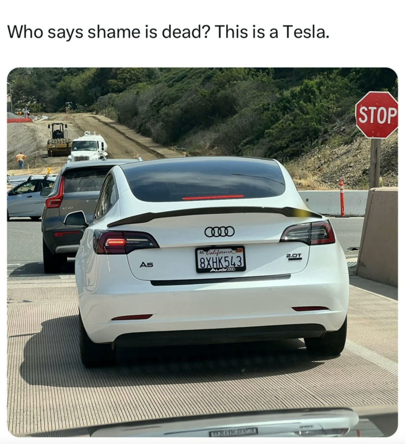 Car - Who says shame is dead? This is a Tesla. As 8XHK543 Stop