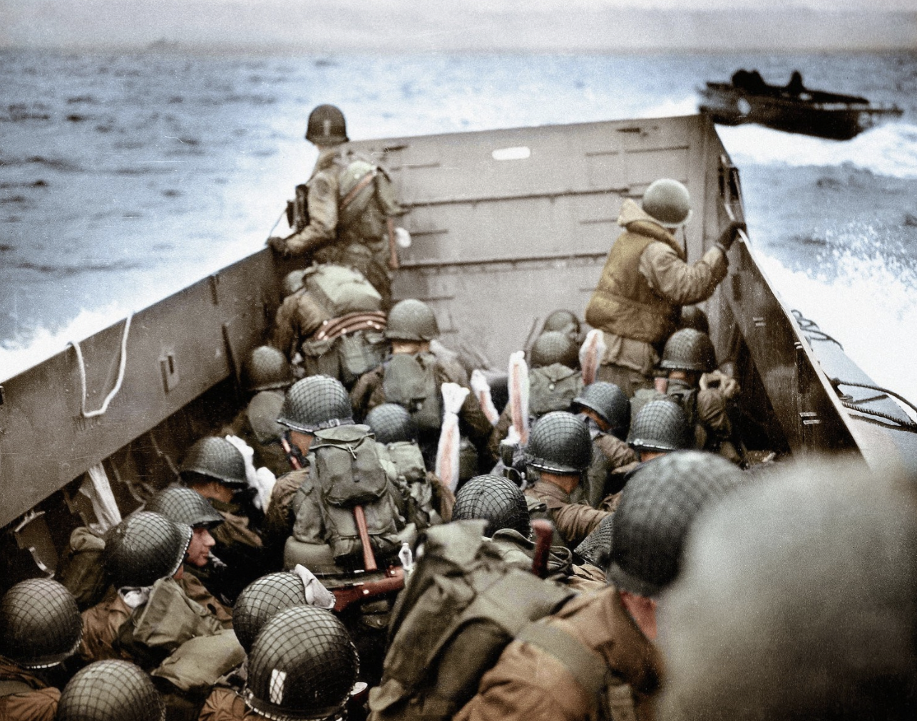 Some of the first American Troops in Higgins boats approaching Omaha Beach.