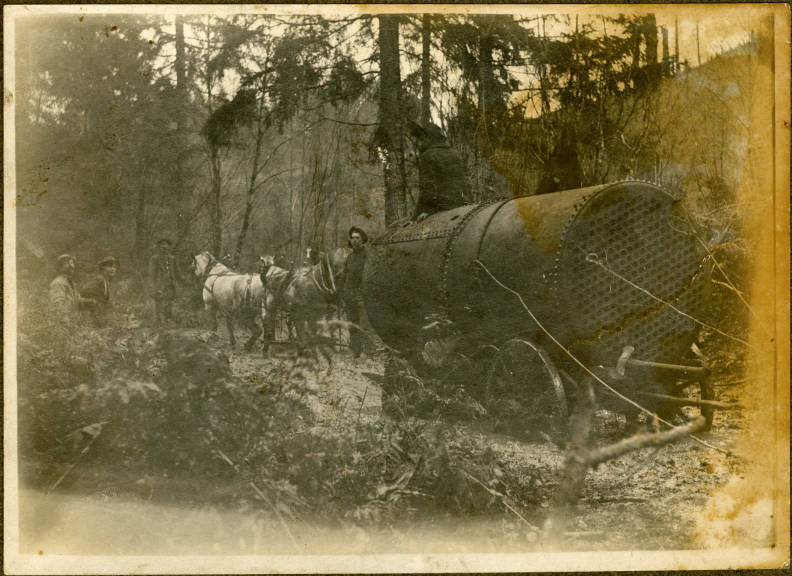 Early Kalama-area loggers with steam donkey, circa 1900-1909.