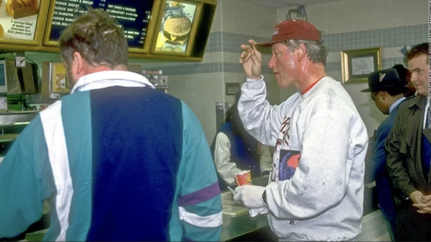 Bill Clinton in a McDonald's in the 90s after jogging.