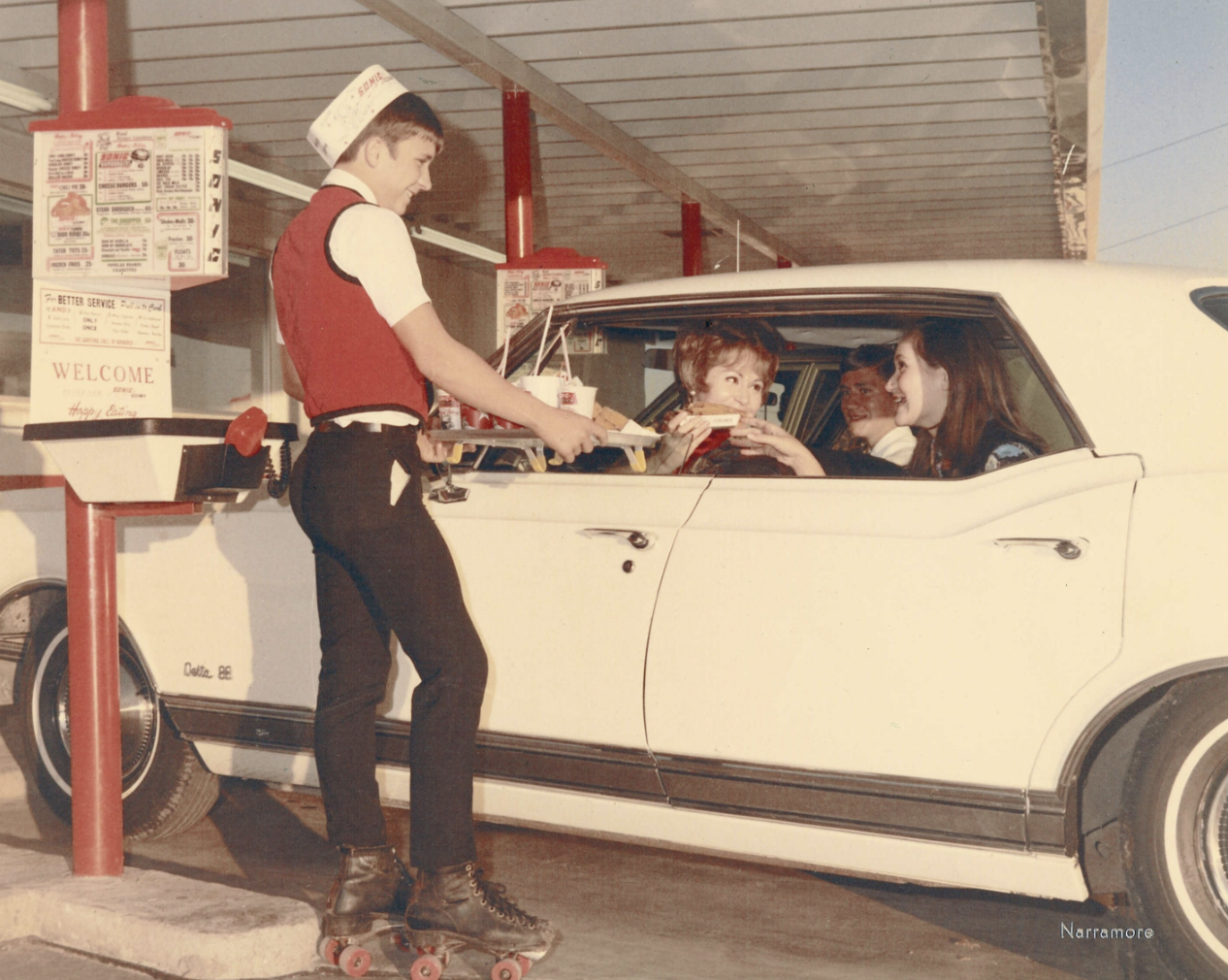 Before McDonald's revolutionized fast food, car hops served food on rollerskates direct to the car. Florida 1967.