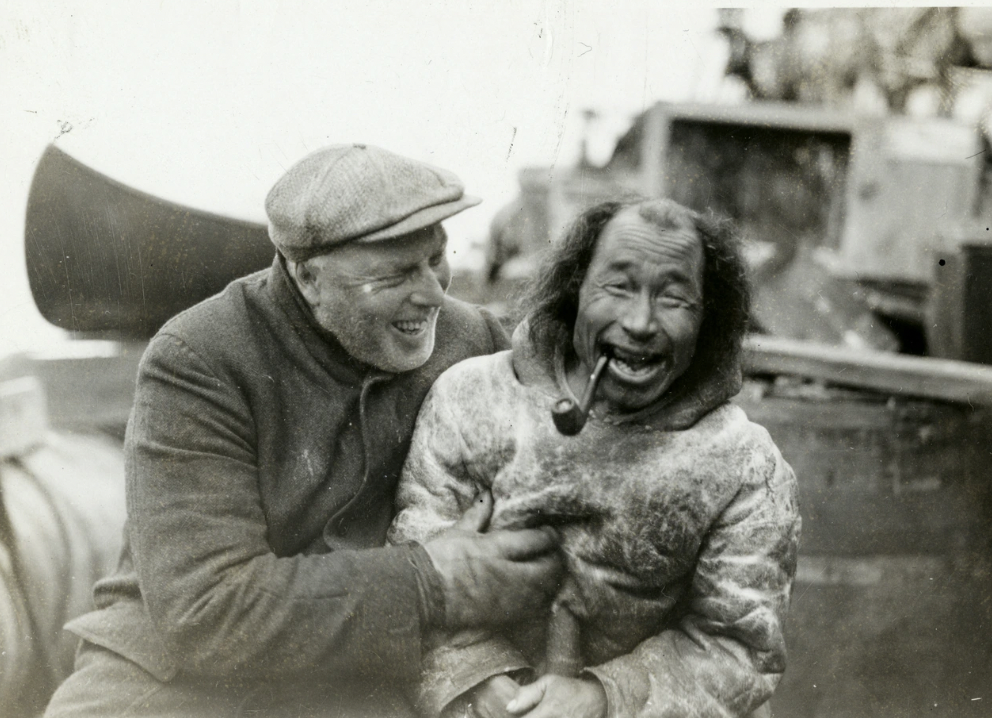 Bob Bartlett and local inhabitant aboard ship during Bartlett's Arctic Expedition, 1933.