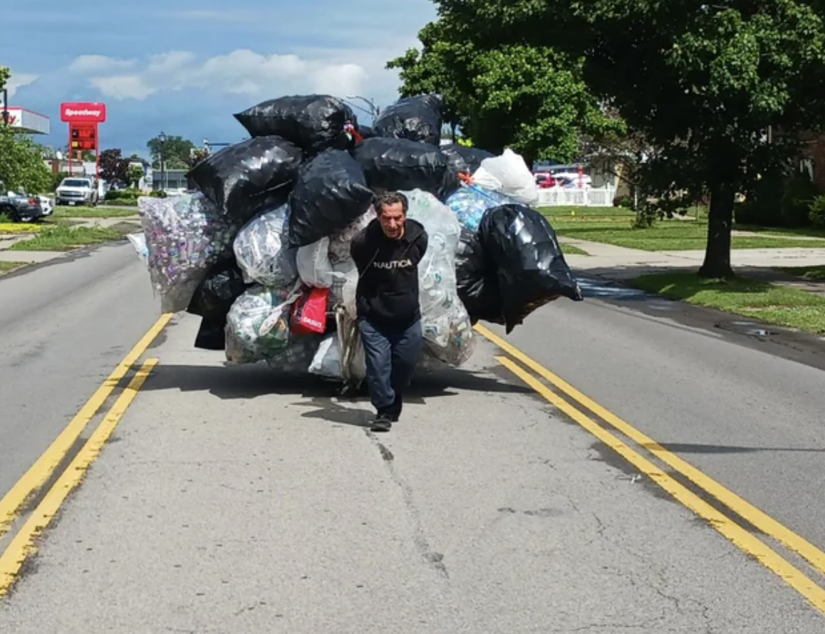 Dude who collects returnable cans in Buffalo New York.