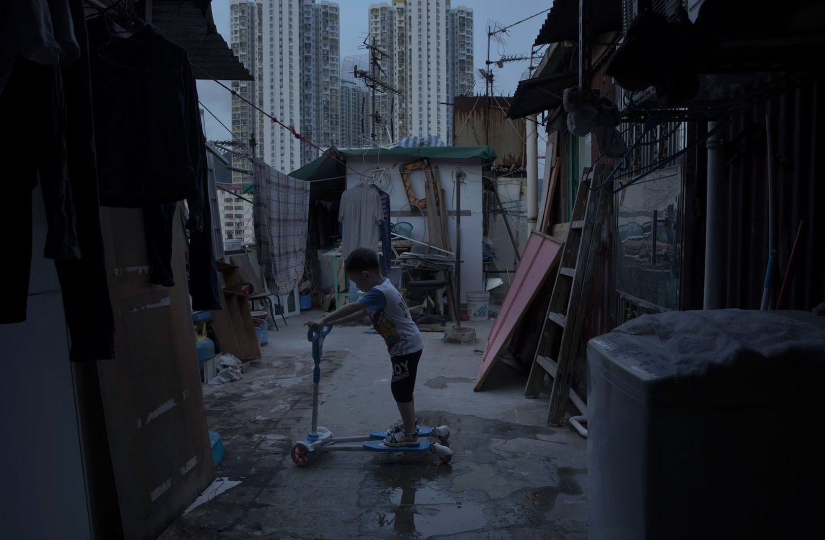 21 People Living in Hong Kong's Tiny 'Coffin Homes'