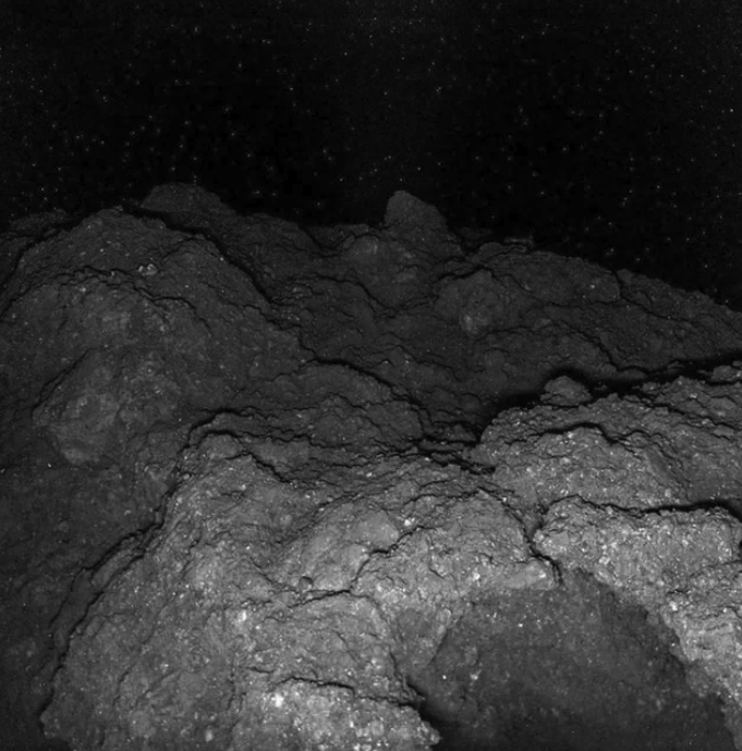 Asteroid images taken by Japanese Hayabusa /Rover 1b