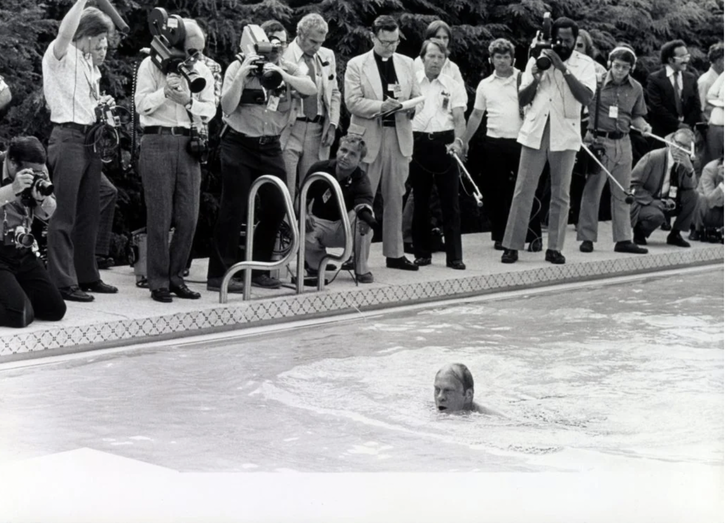 President Ford takes a swim for reporters. 1975.