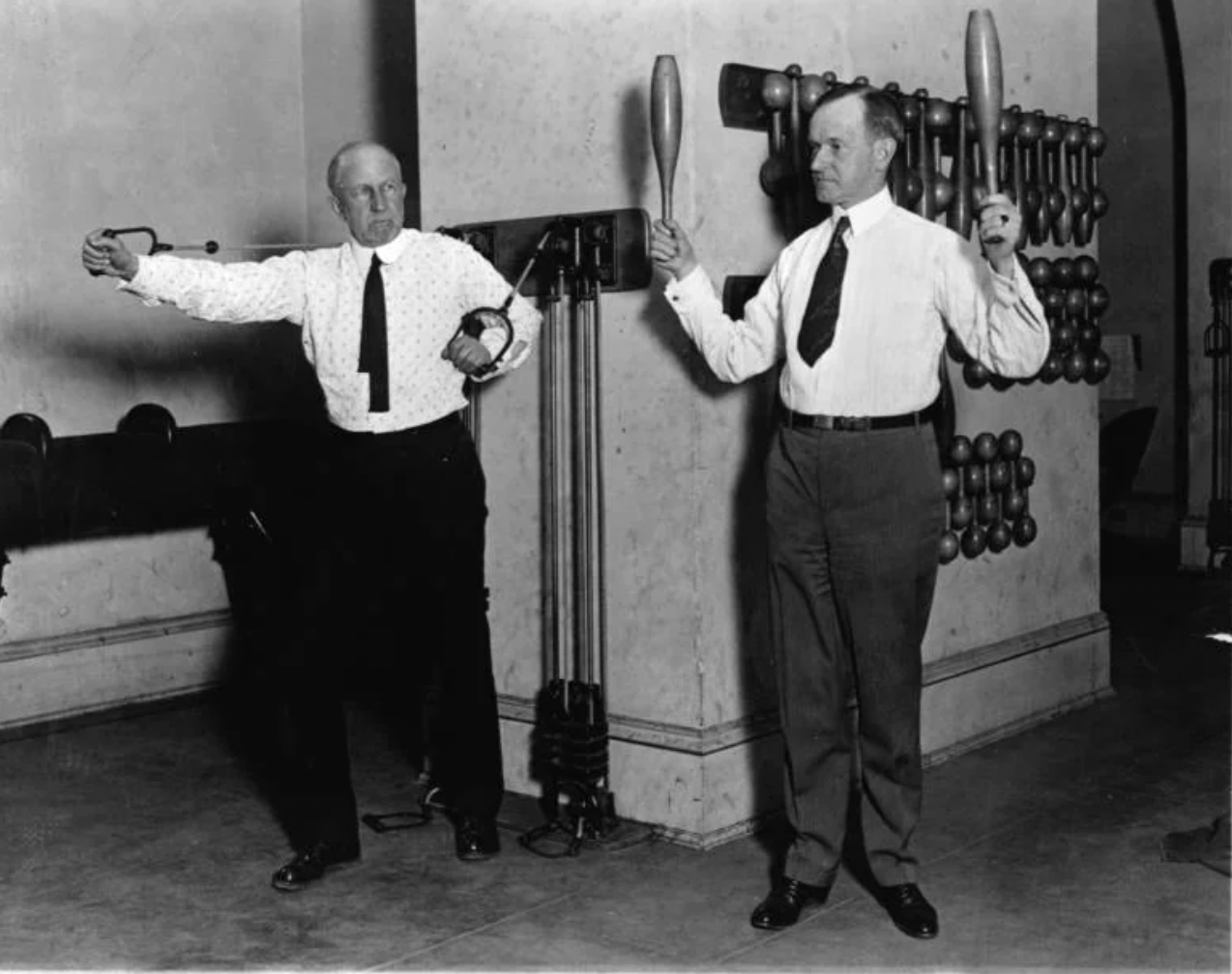 Calvin Coolidge and Speaker of the House Fredrick Gillett exercise in the Congressional gym. 1923.