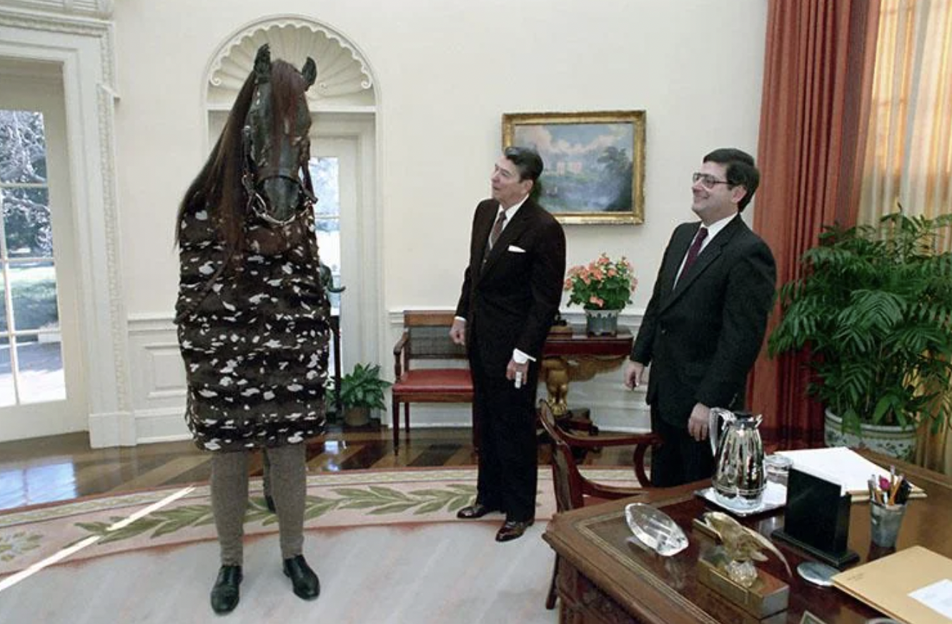 A Fake Horse pays a visit to President Reagan and Chief of Staff Kenneth Duberstein in the Oval Office. 1989.