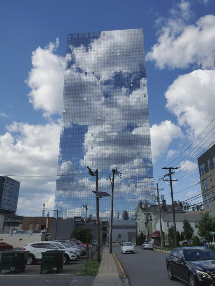 clouds reflecting buildings