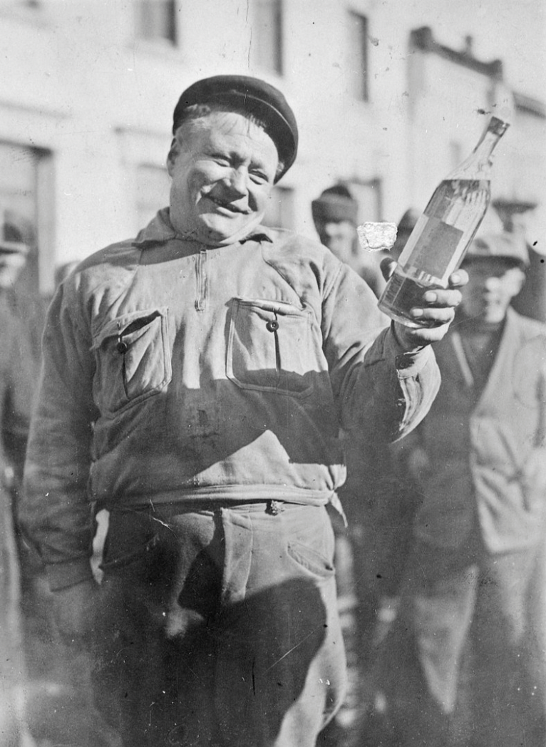 Juho Pirttiaho as the first customer of the Iisalmi liquor shop after the repeal of the Finnish Prohibition, April 5, 1932.