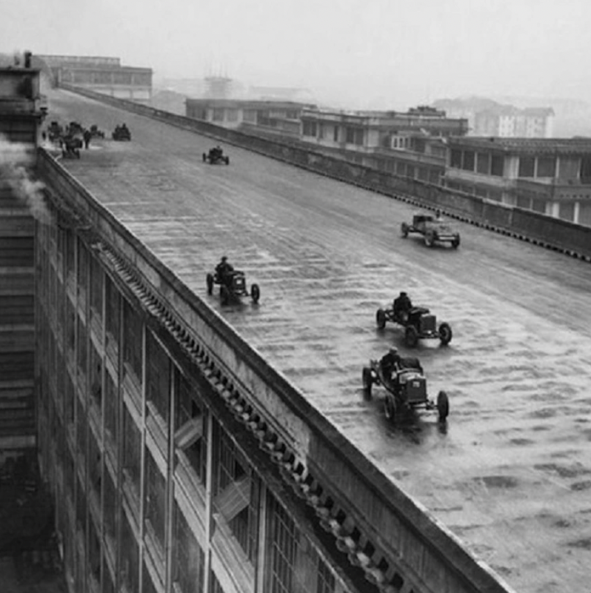 Factory workers race on the roof, or test track, of the Fiat Factory in Turin, Italy. 1923.