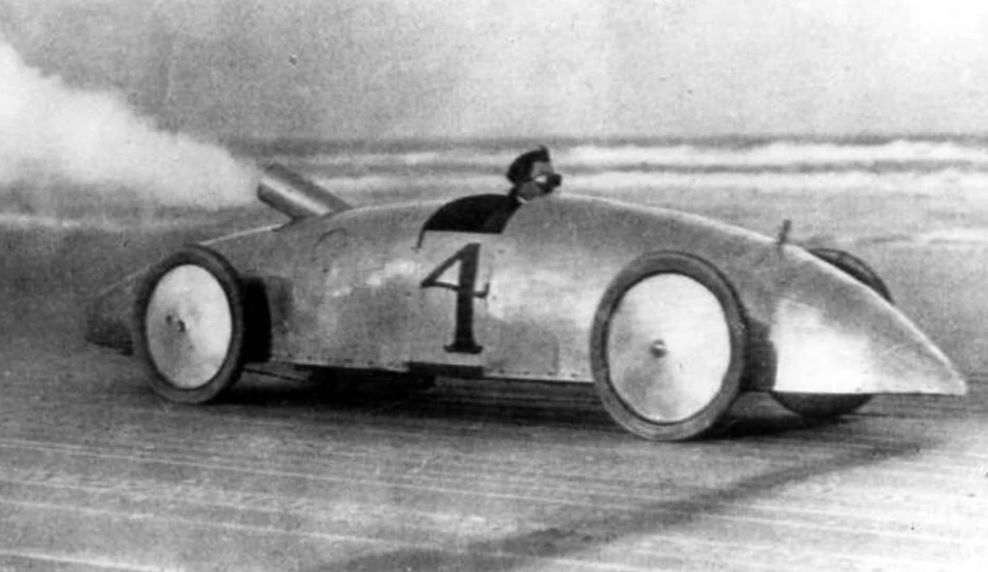 Louis Ross racing in the twin-engined Stanley Woggle-Bug steam automobile, Daytona Beach, Florida, 1905.