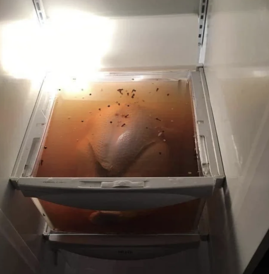 chicken marinating in fridge drawer