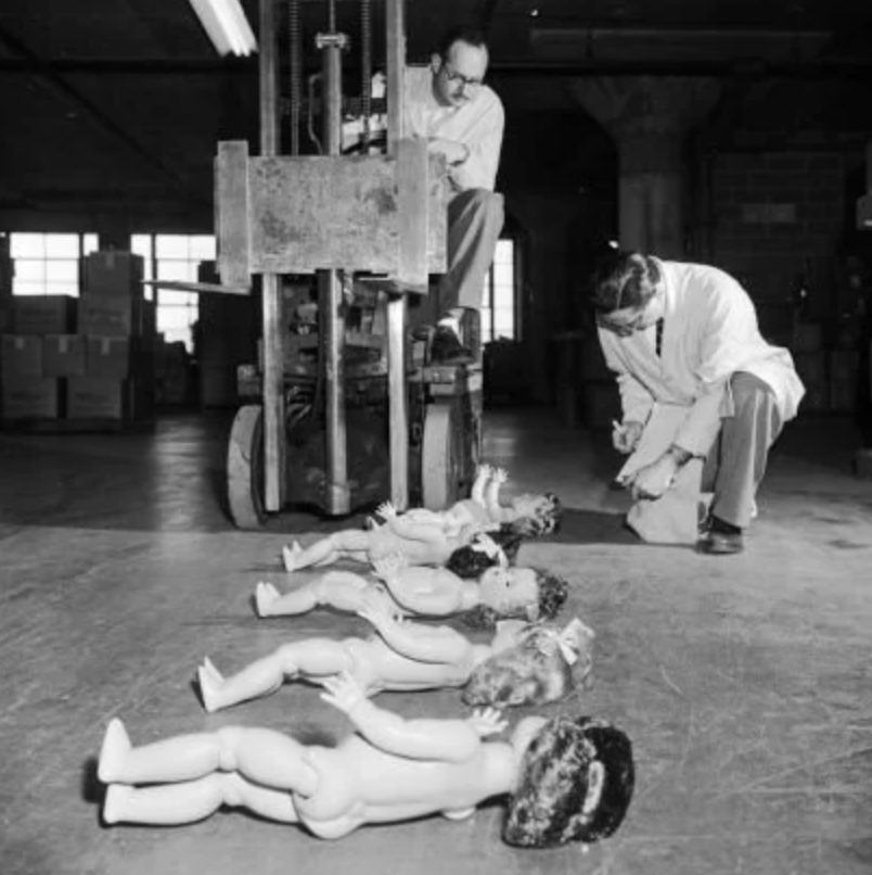 A variety of dolls run over by toy testers at the Ideal Toy company in 1955.