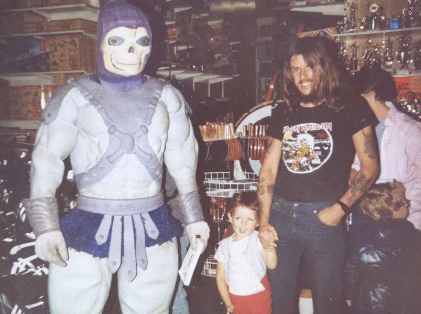 "My Dad taking me to meet He-Man at a toy shop in the UK, 1984."