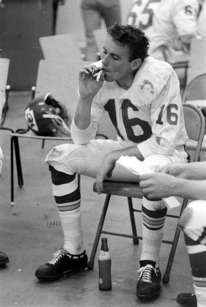 football player drinking at halftime - 65 16.46