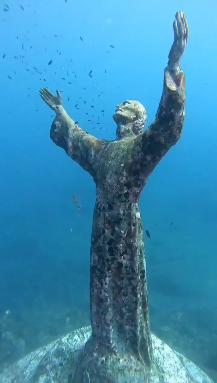 "Christ of the Abyss." A bronze sculpture made by Galletti in 1954. It lies in San Fruttuoso bay, in the Italian Riviera. 