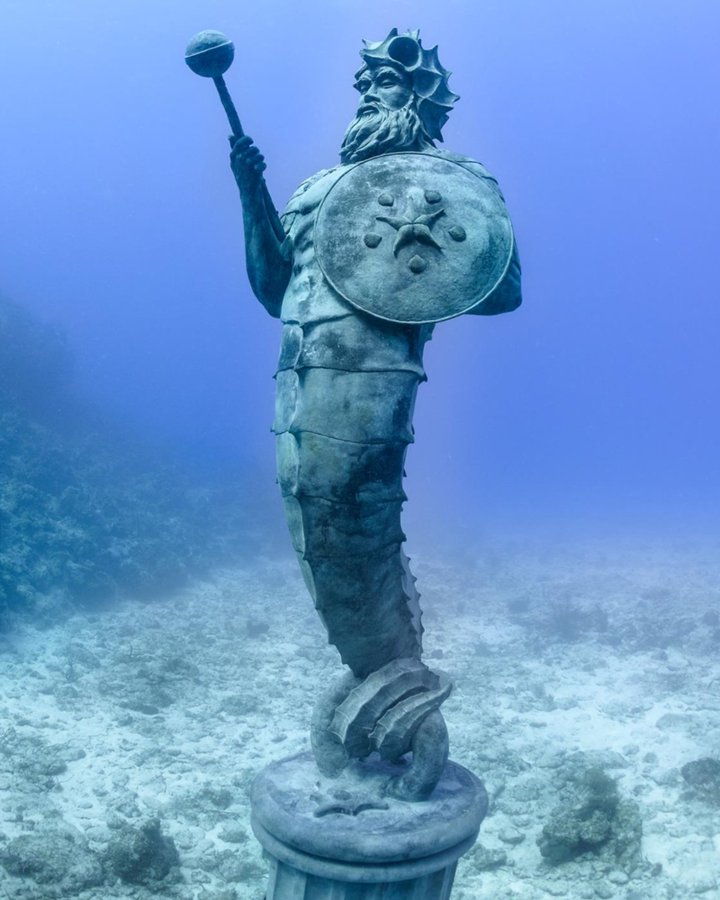 The Guardian of the Reef by by Simon Morris is a 13 feet tall bronze sculpture representing a mythological creature.