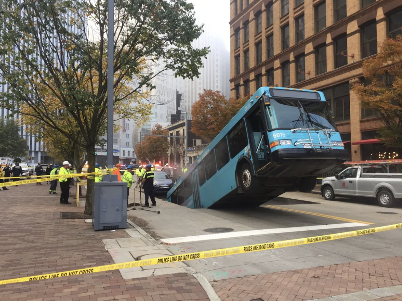 pittsburgh bus falls into sinkhole - Police Line Do Not Cross Police Line Do Not Cross Police Lng Domit 6015