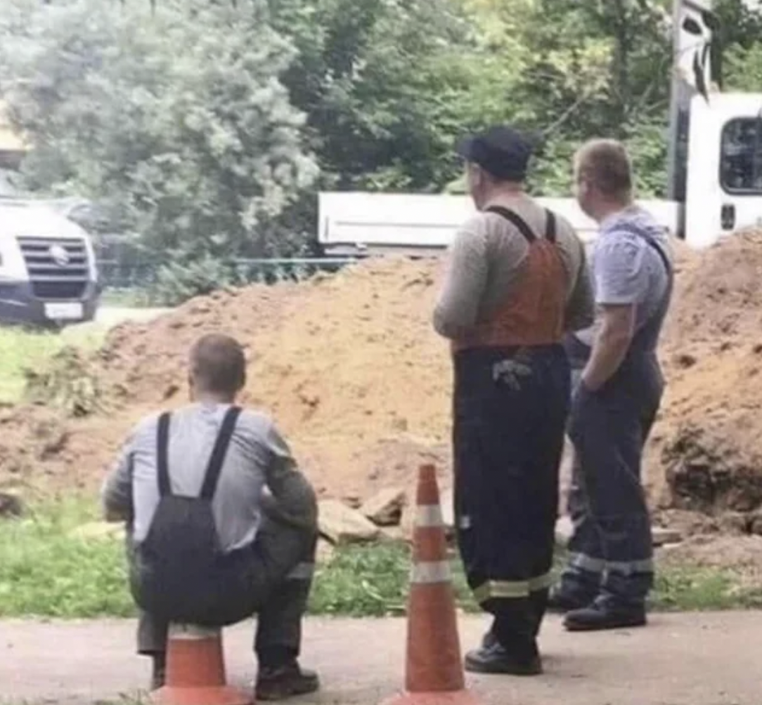 sitting on traffic cone