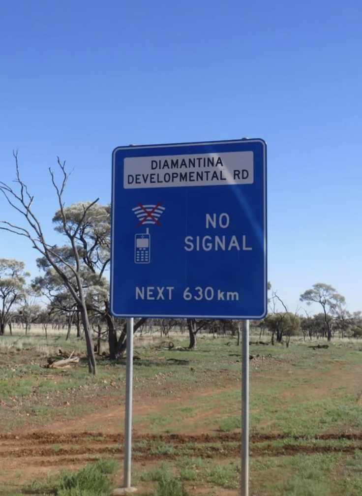 no cell service road sign - Diamantina Developmental Rd No Signal Next 630 km