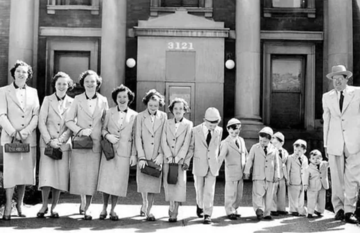 husband and wife with their eleven children palm sunday 1954 - 3121