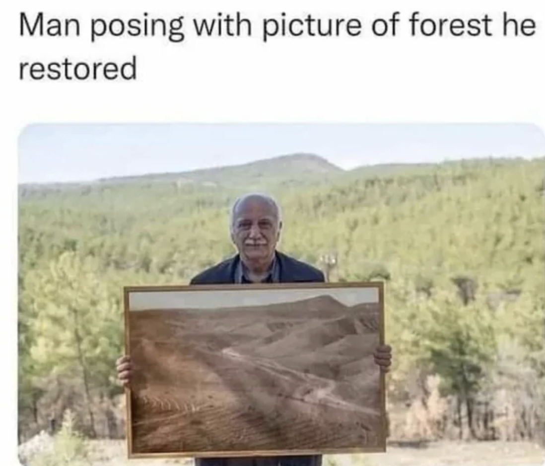 hikmet kaya a retired forest engineer from turkey standing in front of a land which he afforested while holding a photograph of it from 41 years ago when he started - Man posing with picture of forest he restored