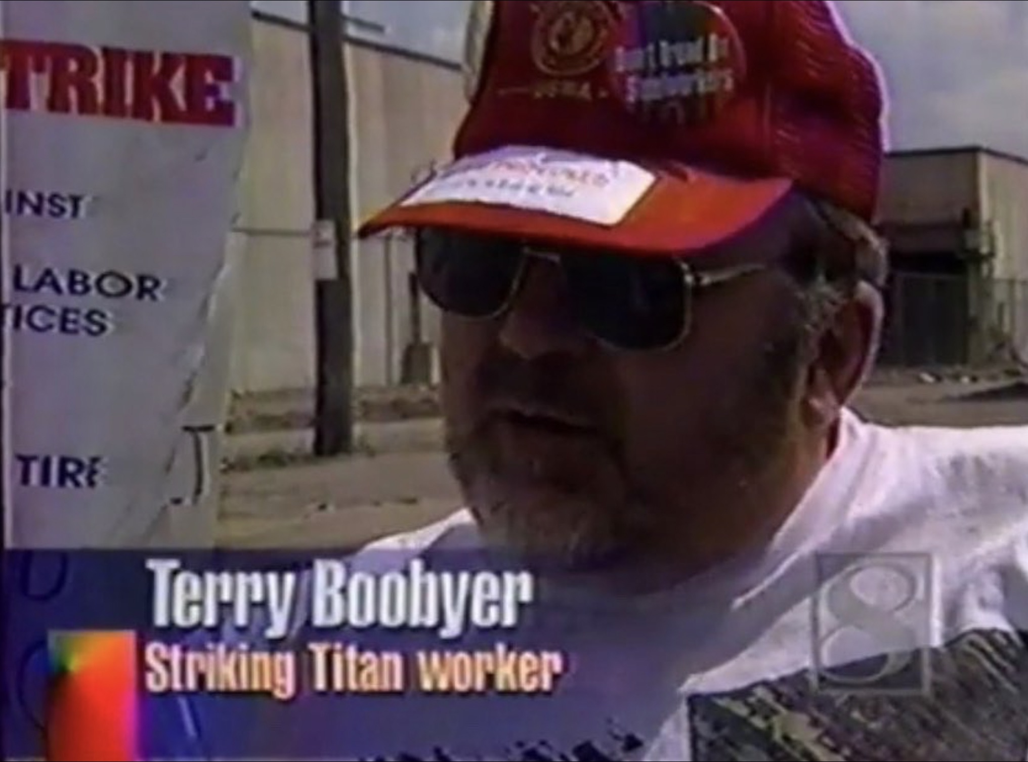 photo caption - Trike Inst Labor Ices Don't Brund Dr Smborker's Tire Terry Boobyer Striking Titan worker