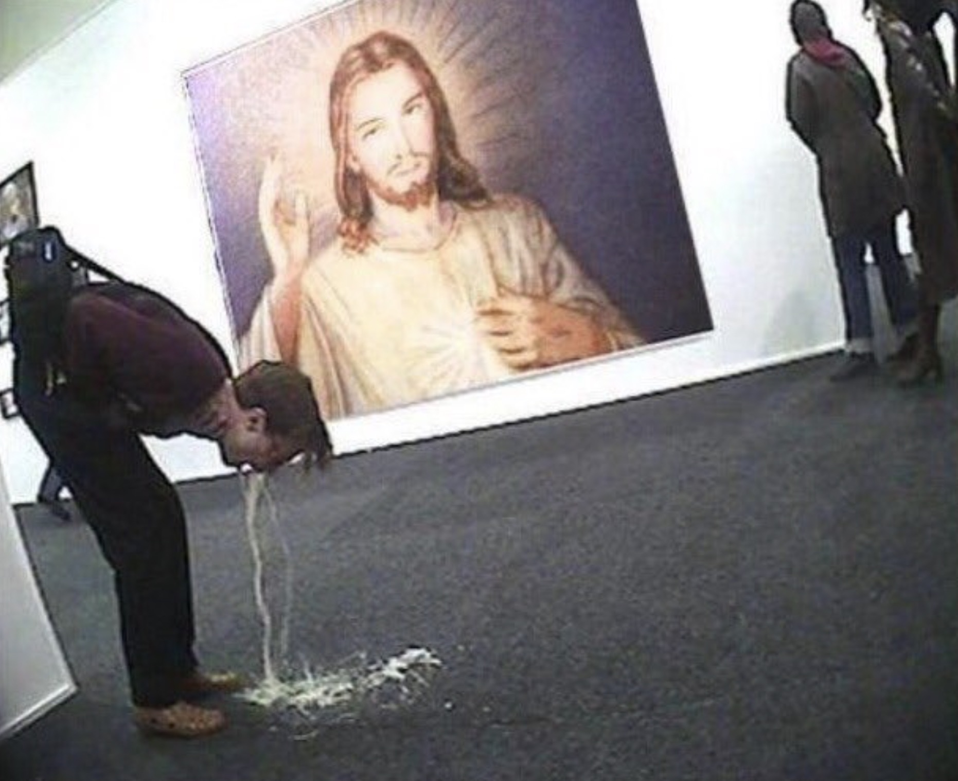 guy puking in front of jesus