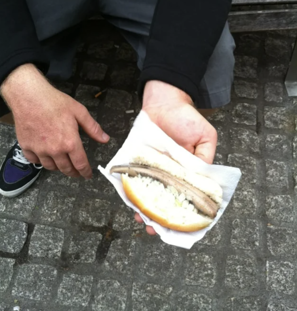 Amsterdam street food: raw herring with onions.