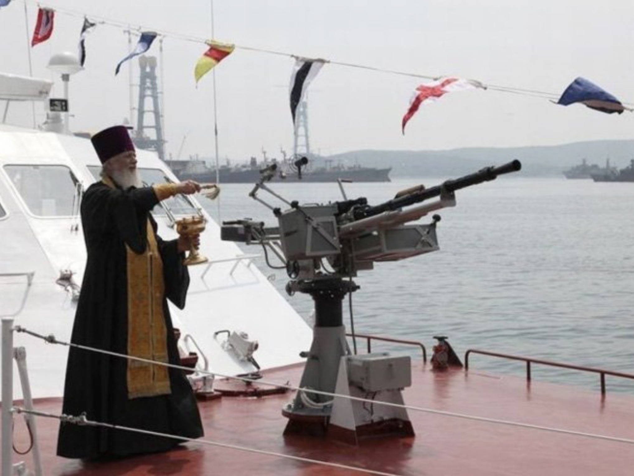 orthodox priest blessing guns