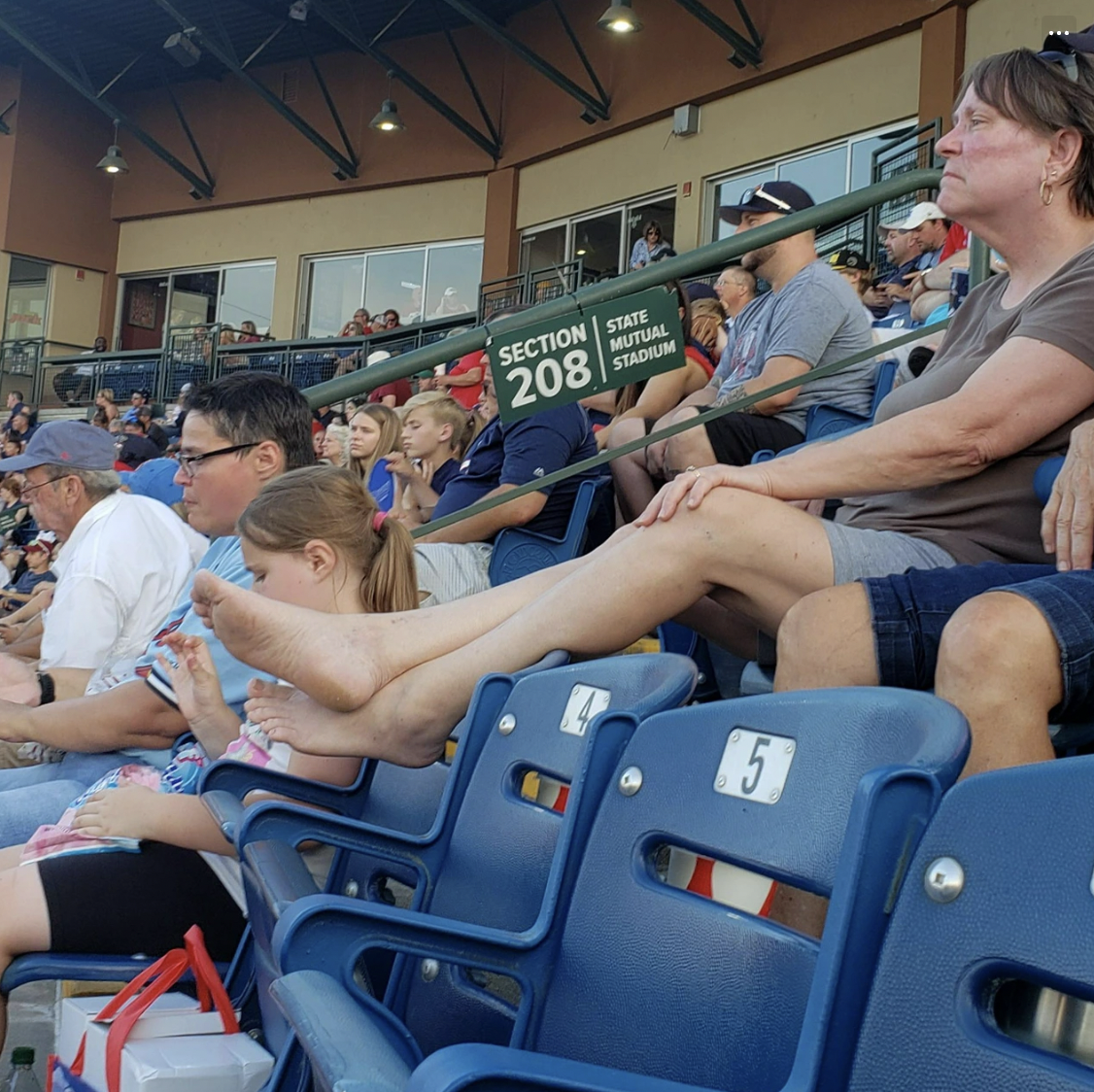 “Imagine going to a baseball game and having feet beside your face.”