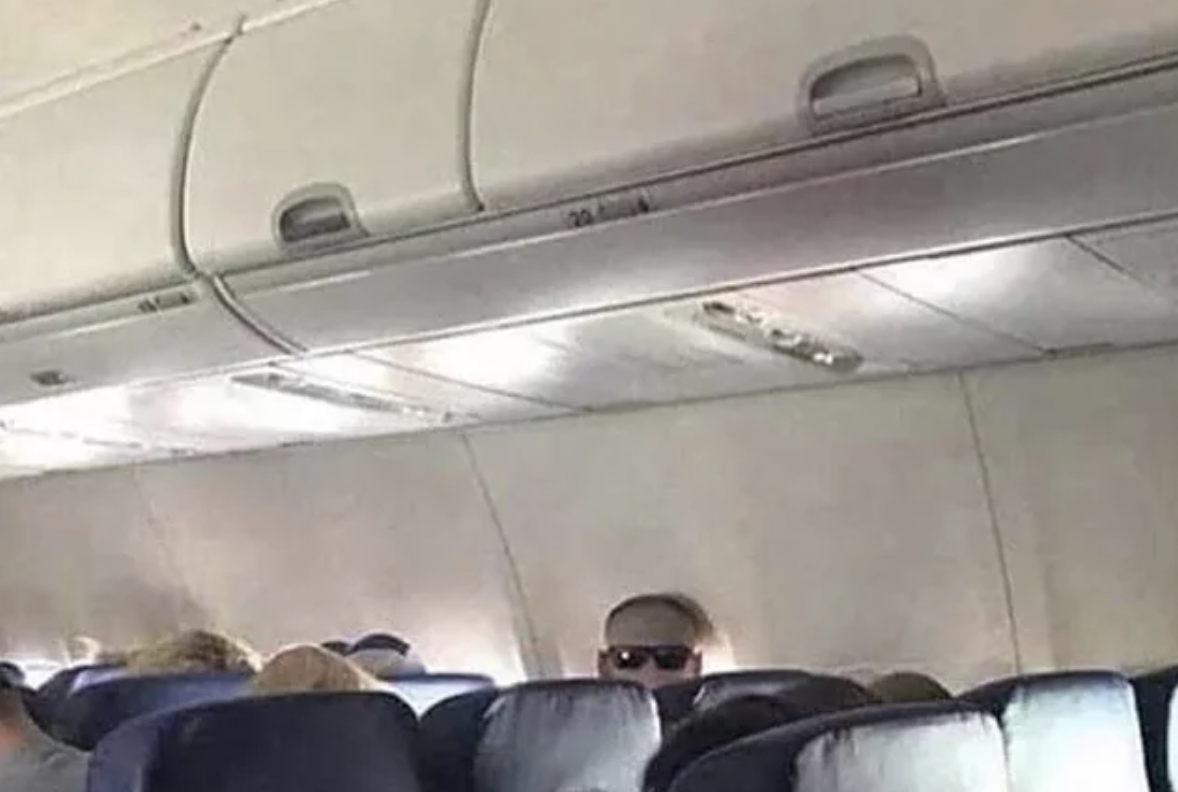 guy on plane staring at me