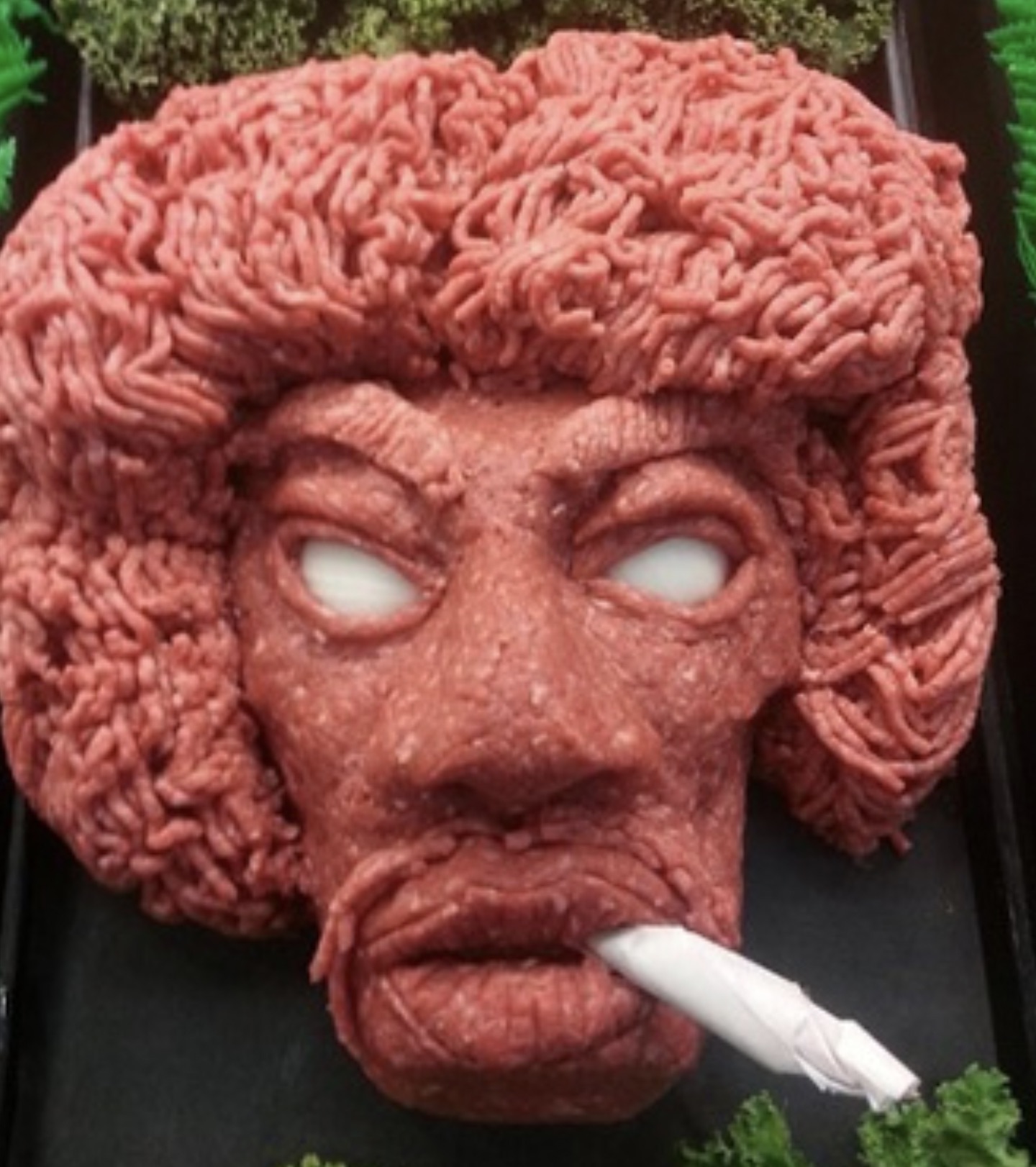 scupture made of ground beef