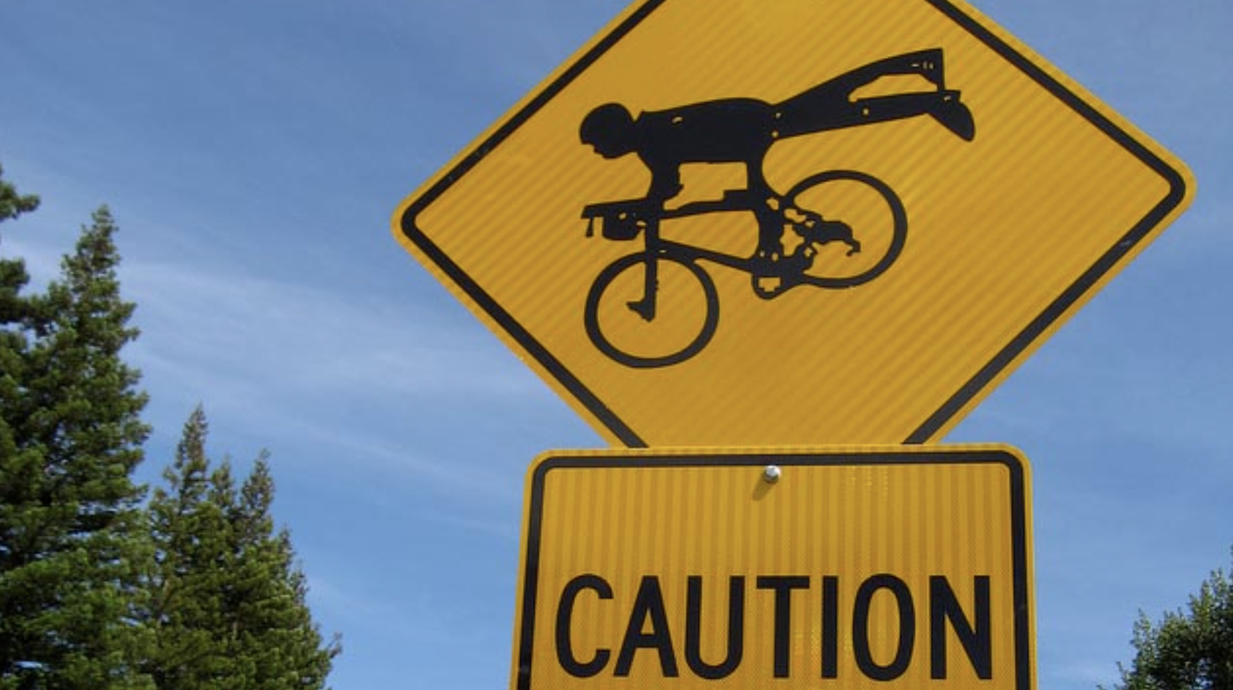 cyclist signs road test - Caution