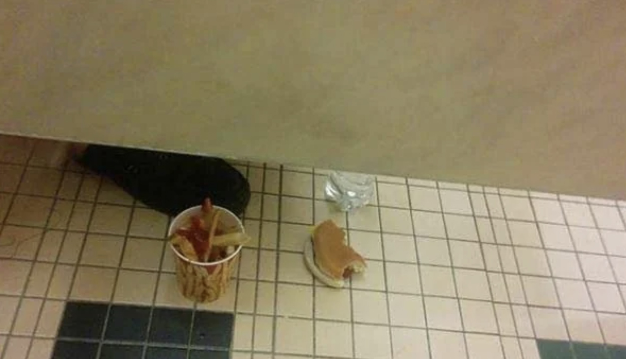 eating in bathroom stall