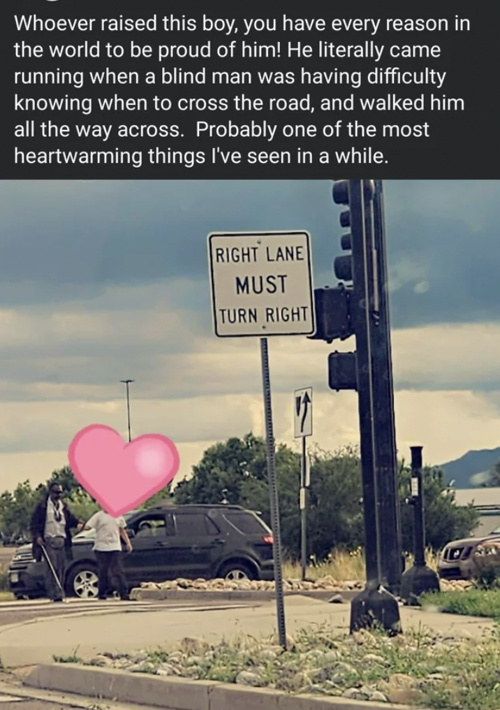 traffic sign - Whoever raised this boy, you have every reason in the world to be proud of him! He literally came running when a blind man was having difficulty knowing when to cross the road, and walked him all the way across. Probably one of the most hea